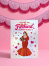 A 5x7 inch pearlescent silver greeting card featuring a flat vector illustration of the drag queen Divine in a red mermaid gown holding a heart-shaped box of chocolates. The text above reads "You're The Filthiest Person Alive" in bold red script with pink sparkles. The card has a shimmering finish that reflects light. Inside text reads "...and I love it." The back features the Honey Dazed logo. Includes a matching envelope.