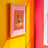 a picture of a ducky in a pink and yellow room
