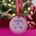 Round pastel purple metal Christmas ornament featuring kawaii ghost in Santa hat with two smaller ghost friends and snowflakes. Text reads "Boo Humbug" in bubble letters.