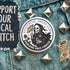 Round pinback button featuring a bold black and white design of a skeleton reaper holding a rainbow pride flag and a drink, wearing a "RESIST" badge, surrounded by black roses, with "Existential Dread Club" in purple letters and "Marching Since Forever" in white. Glossy, metal button in 2" or 3" size.