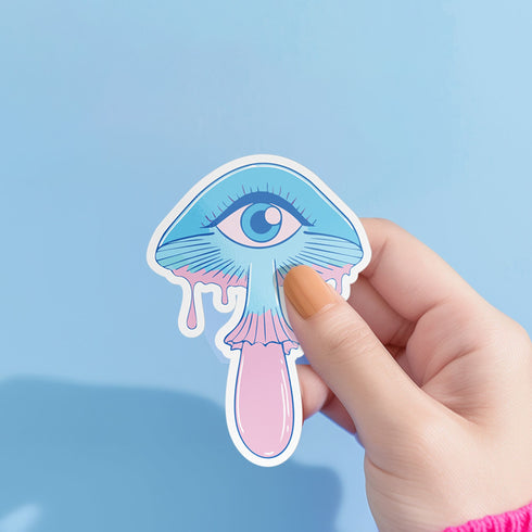 Surreal eyeball mushroom sticker in pastel colors, ideal for decorating laptops, phones, and water bottles. Available in Prism, Gem, and Glitter finishes. Handmade in Austin, Texas.