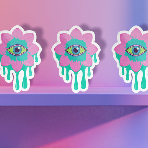 Trippy eyeball flower sticker in pastel pink and green, ideal for quirky and weirdcore enthusiasts. Available in Prism, Gem, and Glitter finishes. Handmade in Austin, Texas.