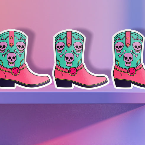Colorful Goth Cowgirl Boot Sticker with teal and pink boot and skulls, perfect for adding a spooky and quirky touch to your belongings.