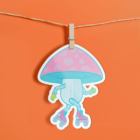 Adorable mushroom sticker with pink roller skates and neon gloves, ideal for roller skate enthusiasts and quirky design lovers. Available in Prism, Gem, and Glitter finishes. Handmade in Austin, Texas.