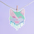 Adorable pastel kitty sticker with a cheeky fanged smile, perfect for adding a playful touch to your accessories. Available in Prism, Gem, and Glitter finishes. Handmade in Austin, Texas.