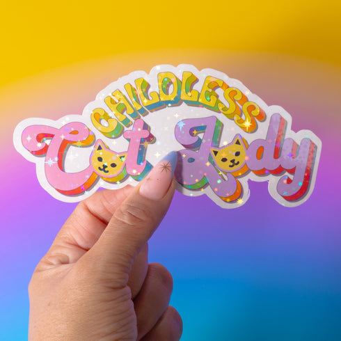 Bold "Childless Cat Lady" sticker with sassy typography and cat silhouettes, embodying feminist political pride.