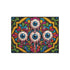 Rectangular doormat with a black background and black edge trim, printed in a flat 2D faux embroidery style. A golden yellow stepped octagon frames four large bloodshot eyeballs with blue irises and dripping pink, with two small peeking eyes among the florals. Hot pink, orange, turquoise, and green folk art petals and green vines fill the corners. Polyester surface with a low pile and non-slip rubber backing. Psychedelic 70s creepy cute decor.