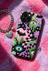 Dual layer phone case in matte or glossy with a 2D print that mimics thick crochet and yarn embroidery. Black bats, pink and green dripping slime, all-seeing eyes with lashes, purple and green daisies, and twisting pink and black checkered worms scatter across a black knit-look background. Smooth printed surface with no raised threads, open ports, and camera cutout. Pastel goth, creepy cute, whimsigoth, spooky maximalist phone accessory and gift.