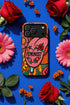 Dual layer matte phone case with a 2D print that mimics knit and embroidery texture. A retro open mouth with its tongue out sits over a pink heart stitched with the word FEMINIST in black letters, on an orange knit-look background filled with pink flowers, yellow sunflowers, red roses, purple and orange blooms, teal leaves, and a turquoise drip, all outlined in bold black. Smooth printed surface, open ports, camera cutout. Feminist maximalist phone accessory.
