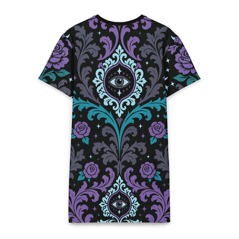 Short sleeve crew neck t-shirt dress in a relaxed, oversized straight cut, made of 100% polyester with a soft matte finish. An edge-to-edge all-over print on a black background shows ornate teal and grey damask scrollwork, purple roses with teal leaves, and a central evil eye framed by a decorative Victorian border and four-point stars. Gothic whimsigoth, dark romantic, witchy Victorian maximalist alt fashion.