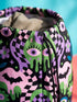 Drawstring backpack measuring 15 by 17 inches, made of 100% polyester with narrow shoulder straps and a drawstring closure. A symmetrical pastel goth print of bats, stylized eyes, flowers, and stars in a soft pastel palette sits on a black base, framed by purple and green checkerboard bands. Creepy cute, whimsigoth, kawaii goth style bag made for the gym, concerts, festivals, travel, school, and everyday carry.