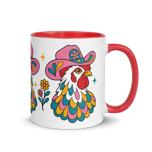 Glossy white ceramic coffee mug with a colored rim, inside, and handle and a full wraparound folk art print. Chickens wear pink cowboy hats with teal bands, yellow diamonds, flowers, and teardrop motifs. The birds have white heads, red combs and wattles, and layered pink, teal, and golden yellow feathers outlined in black. Pink and yellow flowers, teal leaves, and four-point starbursts fill the space between. Retro western kitchen decor.