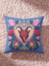Square gothic Christmas throw pillow cover in a folk art design printed to look like textured crewel embroidery on a medium blue background. A red horned Krampus face with a long tongue sits inside a white and gold scalloped heart, surrounded by dark leafy vines, pink tulips, red carnations, gold bells tied with red bows, and small gold stars. Smooth flat 2D print, not raised stitching. Maximalist spooky holiday decor for a sofa, armchair, or goth bedroom.