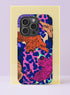 Front view of a dual layer tough phone case printed edge to edge with orange and hot pink tigers prowling over a wild leopard print. The spots are navy and royal blue on a backdrop of hot pink, lavender, peach, and mint, while the striped tigers stretch and pounce across every edge. Loud, clashing, and fully committed to the bit. Maximalist animal print tiger phone accessory with open ports and a precise camera cutout.