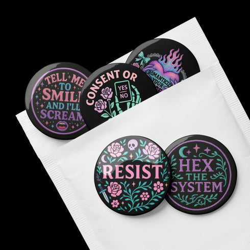Set of five 2.25-inch round button pins featuring feminist and witchy designs with pastel artwork on a black background. Includes slogans like “Hex the System,” “Tell Me to Smile and I’ll Scream,” “Romanticize Your Rage,” “Consent or Coffin,” and “Resist.” Each button has a safety pin backing, a durable tinplate body, and a glossy, scratch and UV-resistant finish with purple, pink, teal, and mint accents.