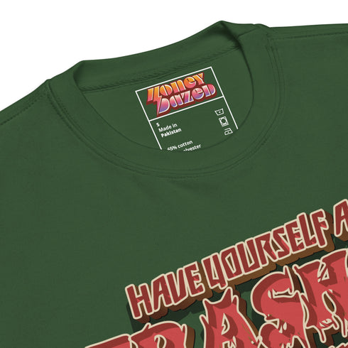 Holiday jumper sweatshirt with "HAVE YOURSELF A TRASHY LITTLE CHRISTMAS" text above a possum wearing a Santa hat, peeking out of a garbage can. Bold, punk-style lettering in red and yellow.