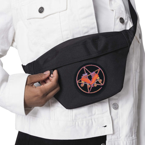 Patch featuring orange roller skates over a purple pentagram, set against a black background. The design combines playful skating elements with a mystical, witchy twist.