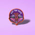 Patch featuring the text 'Eat The Rich' above a design of two open mouths with fangs and a tongue holding an eyeball, set against a purple background with an orange border. The design is bold and edgy.