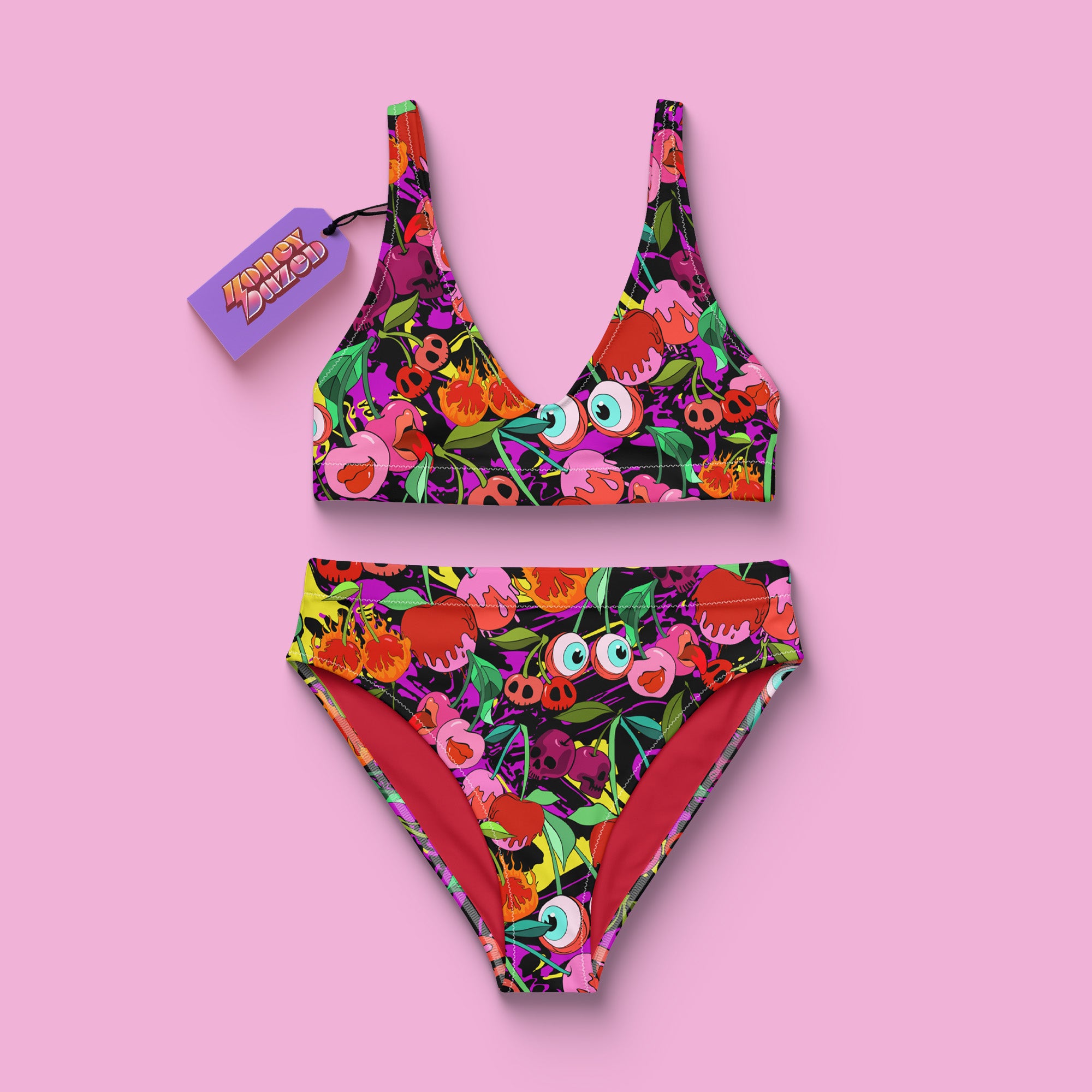a bathing suit with flowers on it and a tag