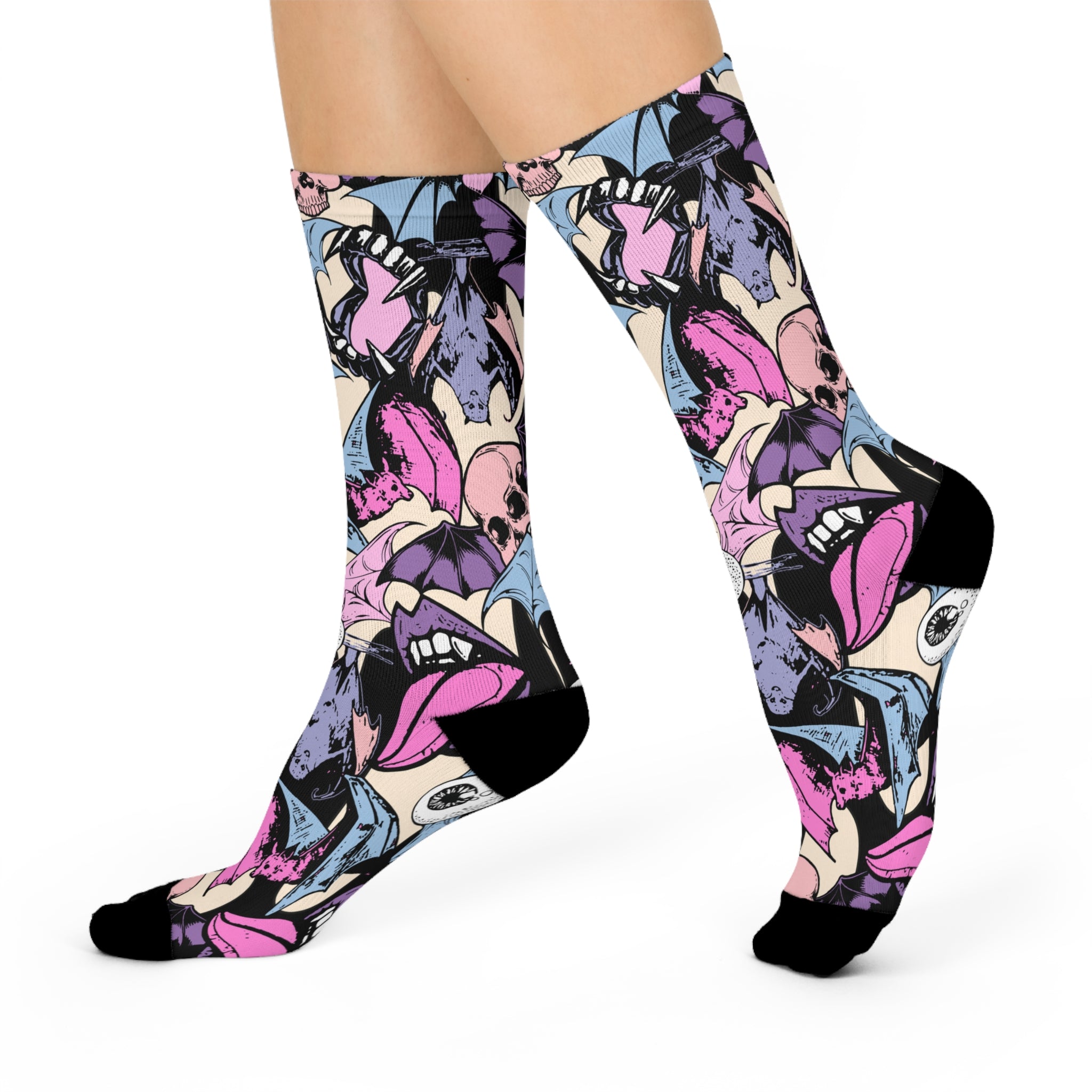 Freaky-fabulous socks sprawled on pink. Bats, skulls, and eyeballs galore. Punk rock meets Dracula's yard sale. Slip these on and let your feet do the screaming.