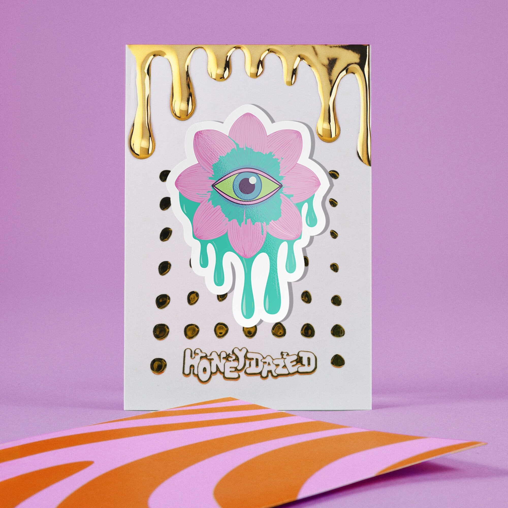 Trippy eyeball flower sticker in pastel pink and green, ideal for quirky and weirdcore enthusiasts. Available in Prism, Gem, and Glitter finishes. Handmade in Austin, Texas.